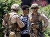 US Marines make first detention in LA as more protests expected
